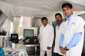 Dabur India Ltd R and D Head Dr J L N Sastry inside the Dabur Mobile Honey Testing Lab Van