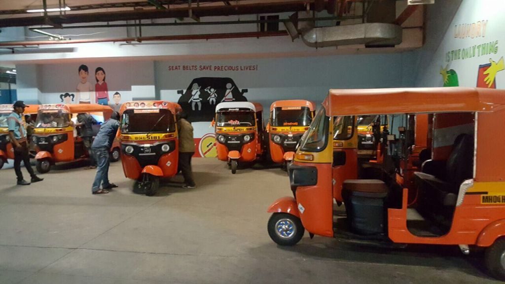 Special Orange colored rickshaw launched at Viviana Mall driven by Women Rickshaw Drivers